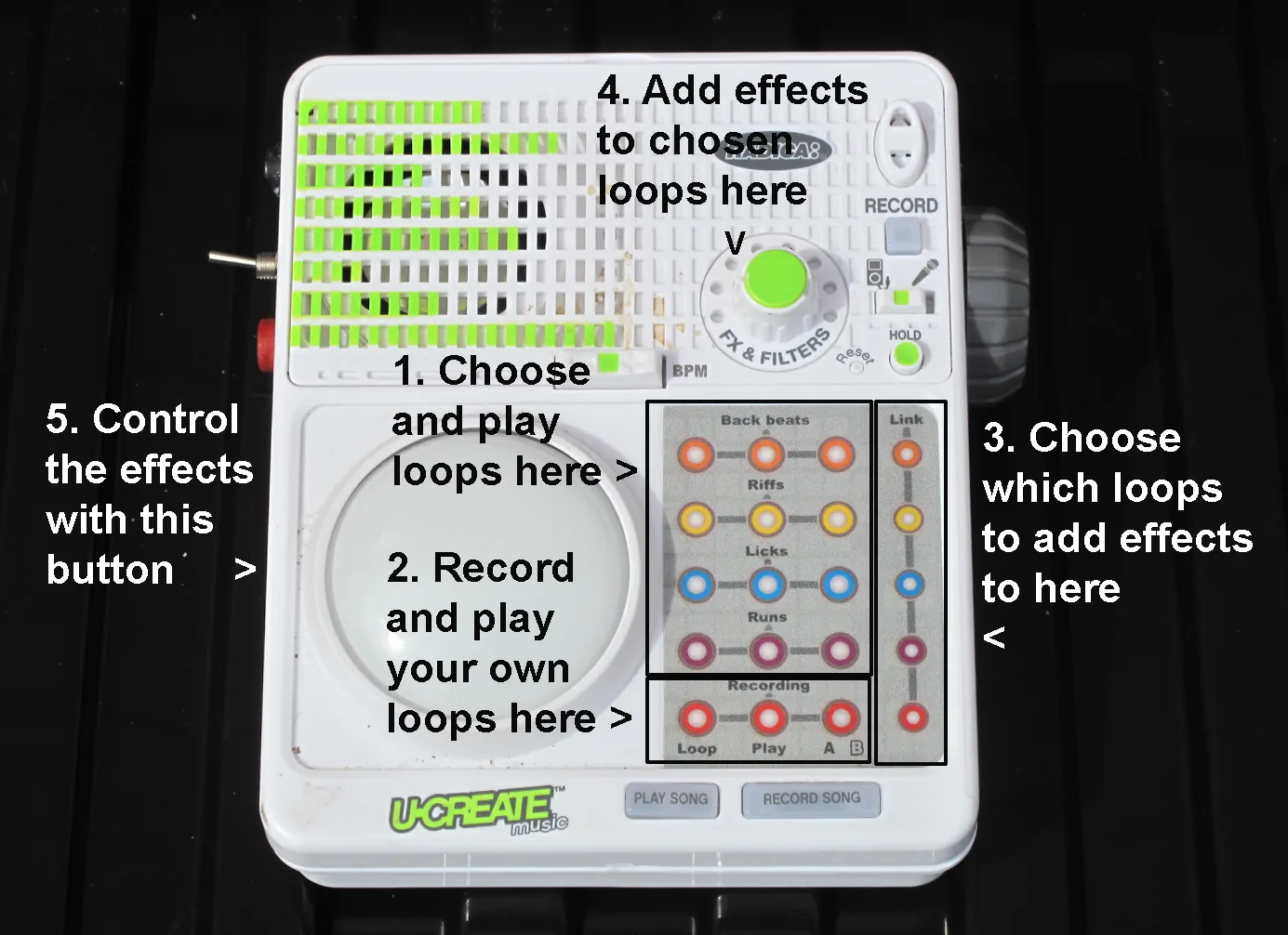 The UCreate's top control panel and its large central button, with the added toggle switch and sockets visible on the left-hand side.