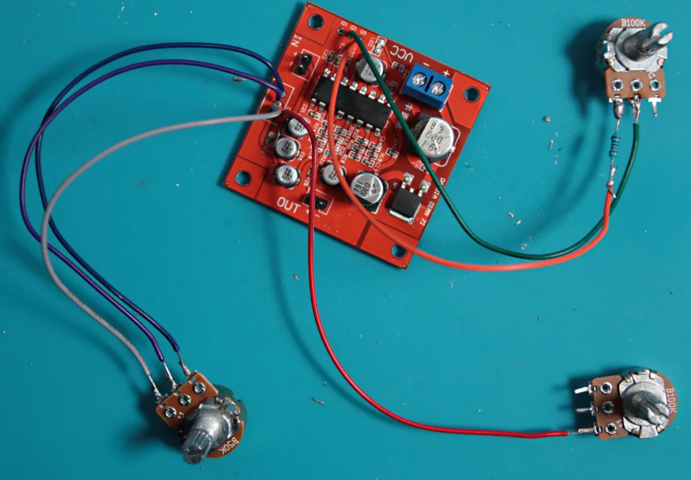 Three potentiometers wired to the delay board.