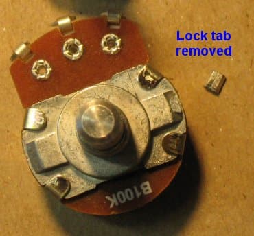A regular-sized pot with the break-off tab removed.