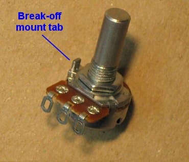 A smaller-sized potentiometer with its break-off lock tab still attached.