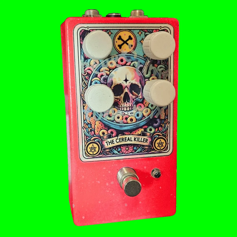 The Cereal Killer prototype pedal - red enclosure with four white knobs and tarot-card skull-in-a-cereal-bowl artwork